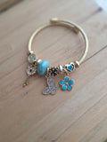Jonc doré charms bleu