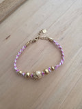 Bracelet tissé rose doré