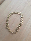 Bracelet doré feuillage