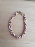 Bracelet doré rose torsade