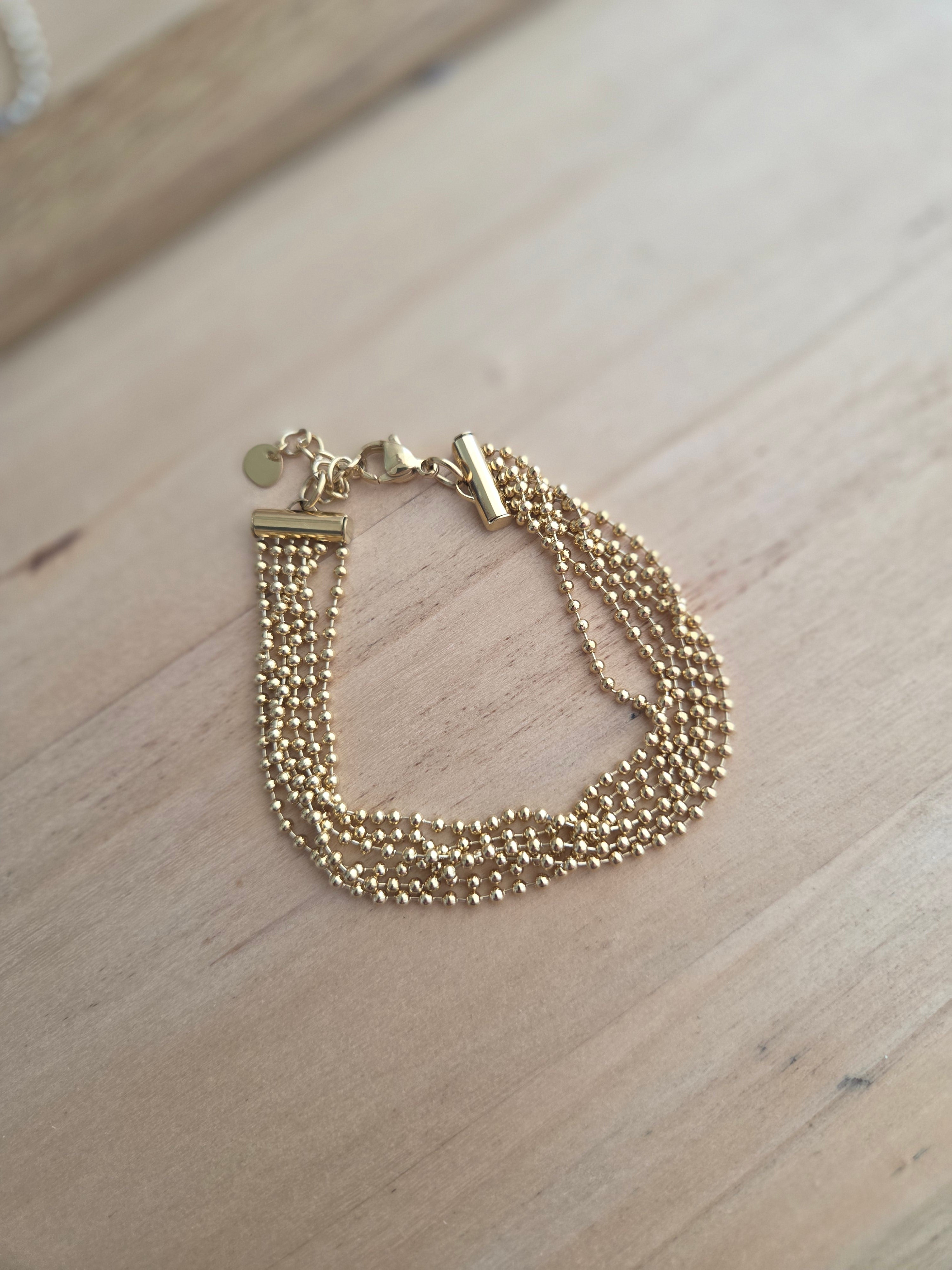 Bracelet doré multi rangs