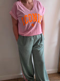 Pantalon fluide kaki à bandes roses