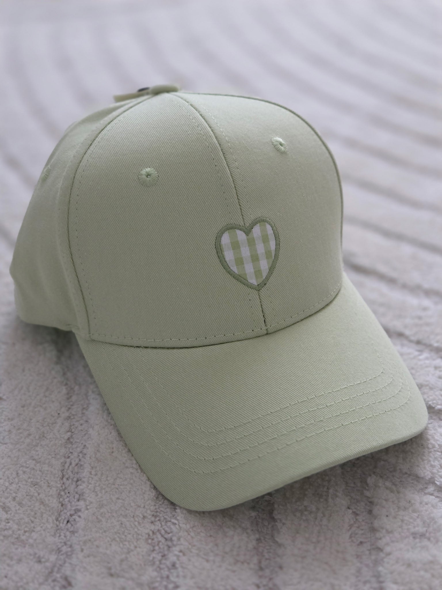 Casquette verte cœur
